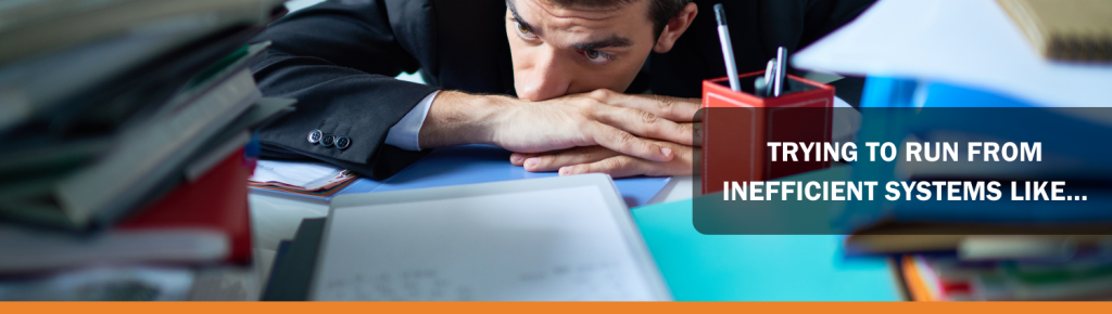 Business man in front of a desk, lying on his arms in front of paper stacks