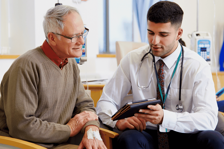 Doctor working with Appenate apps to capture patients symptoms.
